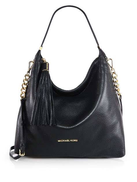 michael kors schminktasche schwarz|black leather handbags Michael Kors.